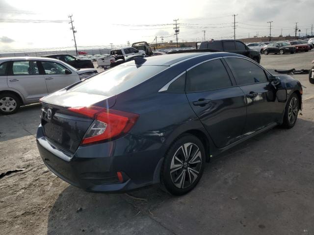 Photo 3 from auction – 2016 HONDA CIVIC with VIN 19XFC1F32GE031664