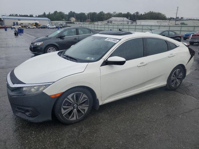 HONDA CIVIC EX 2017 with VIN 2HGFC1F32HH655908 - Photo from auction