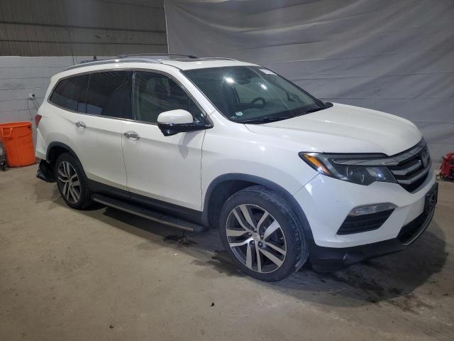 Photo 4 from auction – 2017 HONDA PILOT TOURING with VIN 5FNYF6H98HB000509