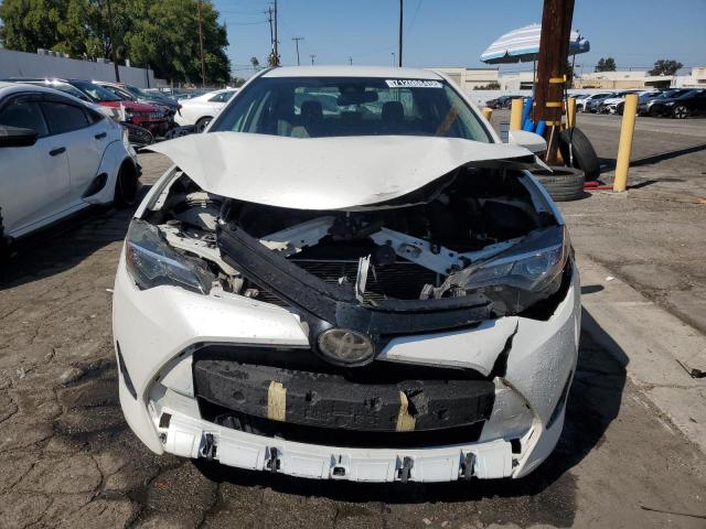 Photo 5 from auction – 2018 TOYOTA COROLLA L with VIN 5YFBURHE2JP792659