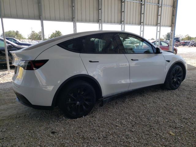 Photo 3 from auction – 2023 TESLA MODEL Y with VIN 7SAYGAEE1PF715604