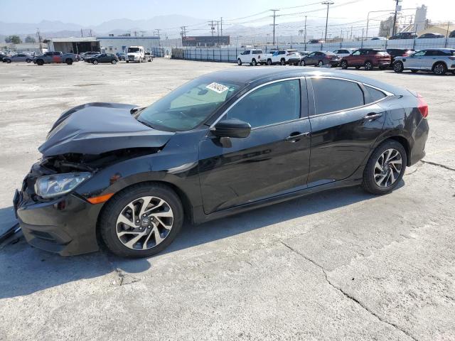 HONDA CIVIC EX 2018 with VIN 19XFC2F76JE200455 - Photo from auction