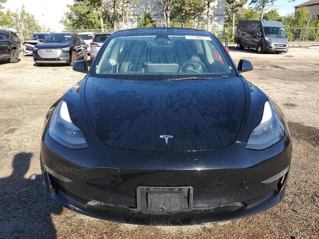 Photo 5 from auction – 2022 TESLA MODEL 3 with VIN 5YJ3E1EB3NF305032