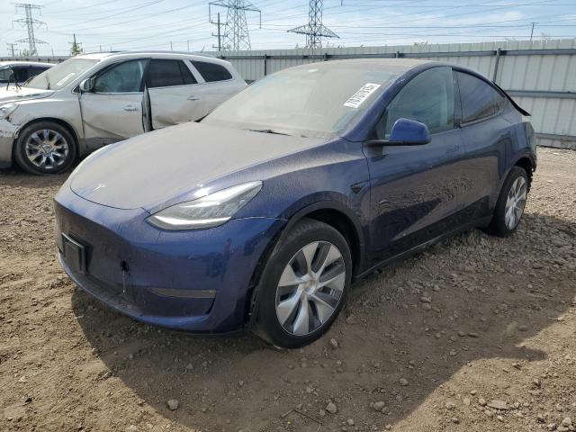 TESLA MODEL Y 2023 with VIN 7SAYGDEE1PA067020 - Photo from auction