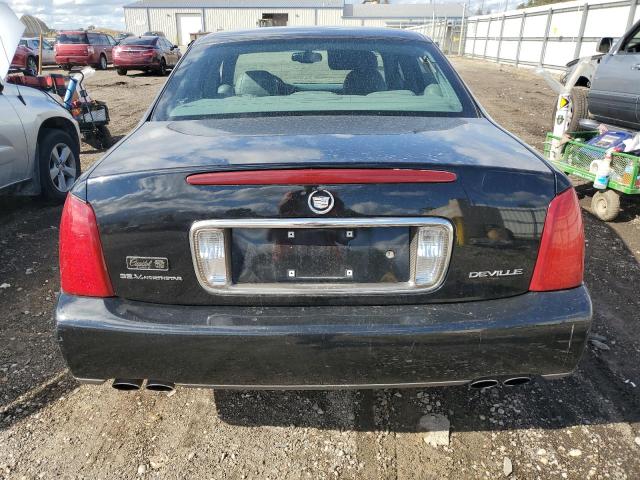 Photo 6 from auction – 2002 CADILLAC DEVILLE with VIN 1G6KD54Y12U128210