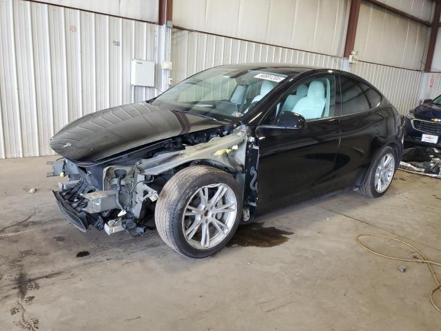 TESLA MODEL Y 2023 with VIN 7SAYGAEE4PF803482 - Photo from auction