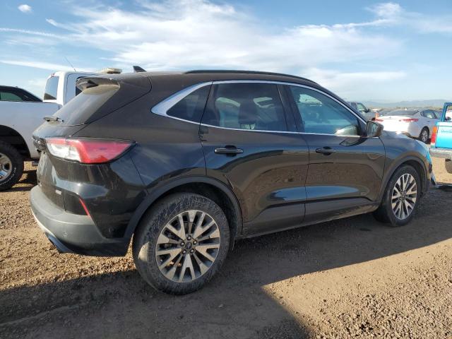 Photo 3 from auction – 2021 FORD ESCAPE TITANIUM with VIN 1FMCU0DZ7MUA37521