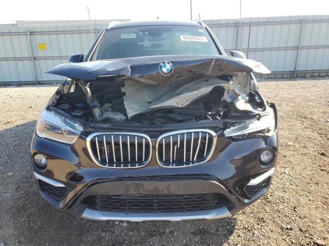 Photo 5 from auction – 2016 BMW X1 XDRIVE2 with VIN WBXHT3C32G5E51760