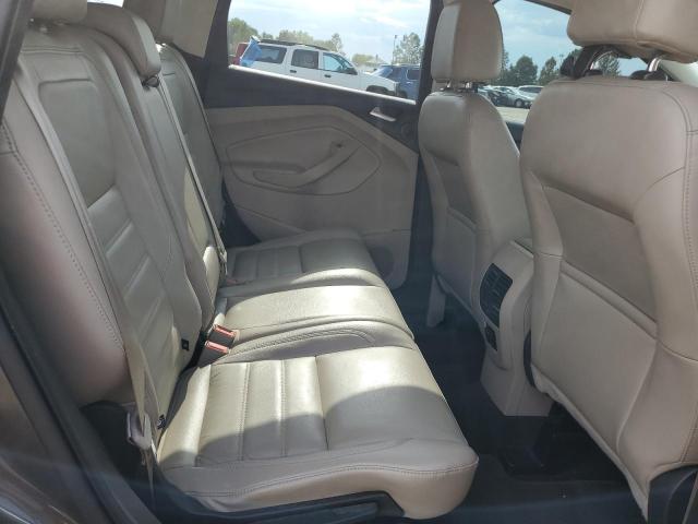 Photo 11 from auction – 2017 FORD ESCAPE TITANIUM with VIN 1FMCU0J94HUB29289