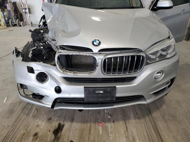 Photo 12 from auction – 2016 BMW X5 XDRIVE3 with VIN 5UXKR0C5XG0P20467