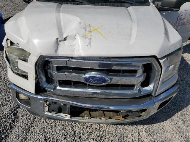 Photo 11 from auction – 2015 FORD F150 SUPERCREW with VIN 1FTEW1C87FKF07650
