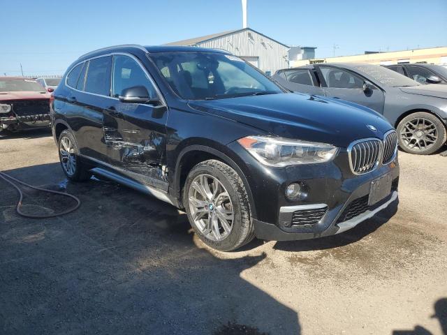 Photo 4 from auction – 2019 BMW X1 XDRIVE2 with VIN WBXHT3C58K5N75412