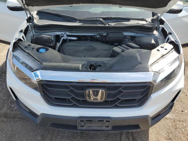 Photo 11 from auction – 2023 HONDA RIDGELINE with VIN 5FPYK3F58PB025040
