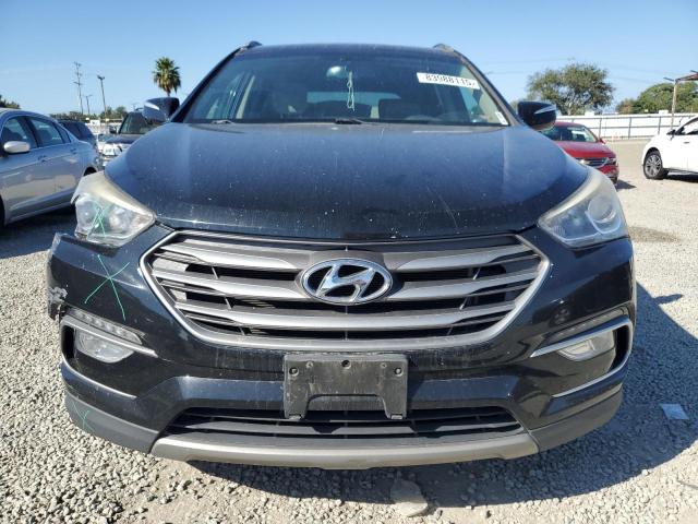 Photo 5 from auction – 2018 HYUNDAI SANTA FE S with VIN 5NMZU3LB4JH059399