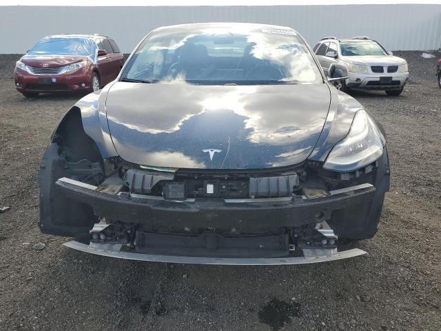 Photo 5 from auction – 2018 TESLA MODEL 3 with VIN 5YJ3E1EA1JF070910