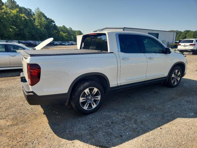 Photo 3 from auction – 2018 HONDA RIDGELINE with VIN 5FPYK3F70JB006099