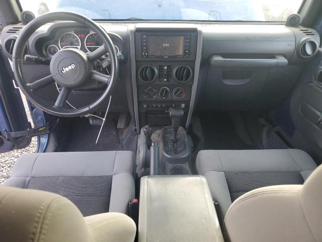 Photo 8 from auction – 2010 JEEP WRANGLER U with VIN 1J4BA6H18AL115204
