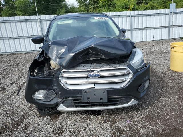 Photo 5 from auction – 2017 FORD ESCAPE SE with VIN 1FMCU0G92HUB09579