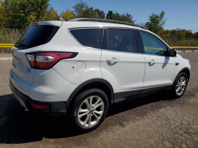 Photo 3 from auction – 2018 FORD ESCAPE SEL with VIN 1FMCU9HD9JUC40053