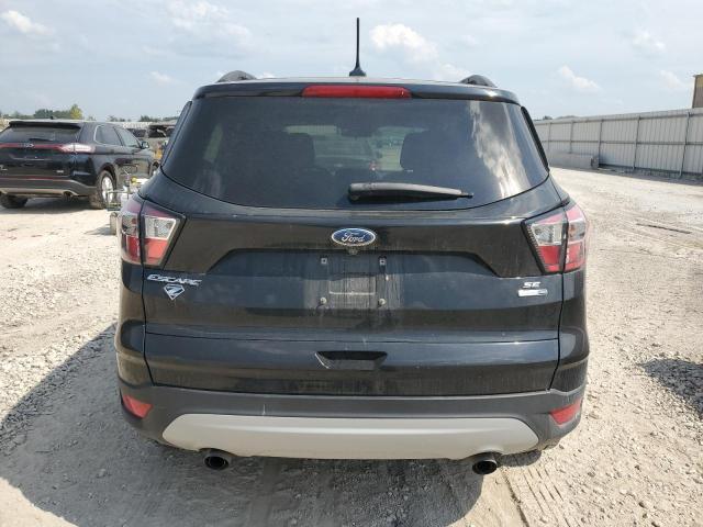 Photo 6 from auction – 2018 FORD ESCAPE SE with VIN 1FMCU9GD3JUA29657