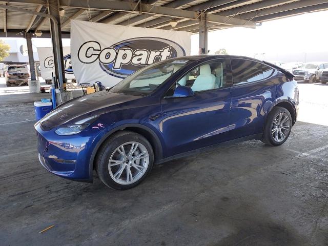 TESLA MODEL Y 2023 with VIN 7SAYGDEEXPF967210 - Photo from auction