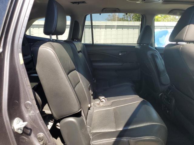 Photo 11 from auction – 2021 HONDA PILOT TOUR with VIN 5FNYF5H95MB023556