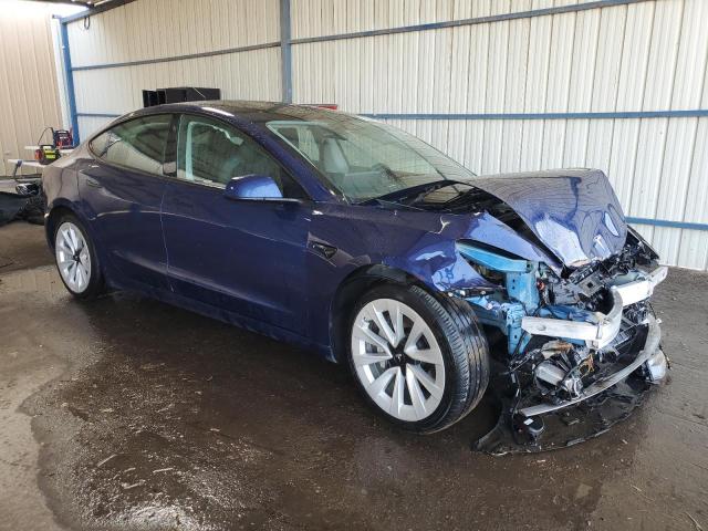 Photo 4 from auction – 2022 TESLA MODEL 3 with VIN 5YJ3E1EAXNF372296