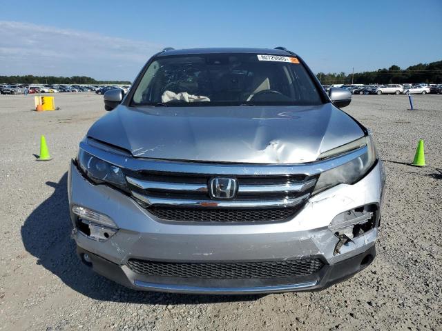 Photo 5 from auction – 2017 HONDA PILOT TOUR with VIN 5FNYF5H98HB027672