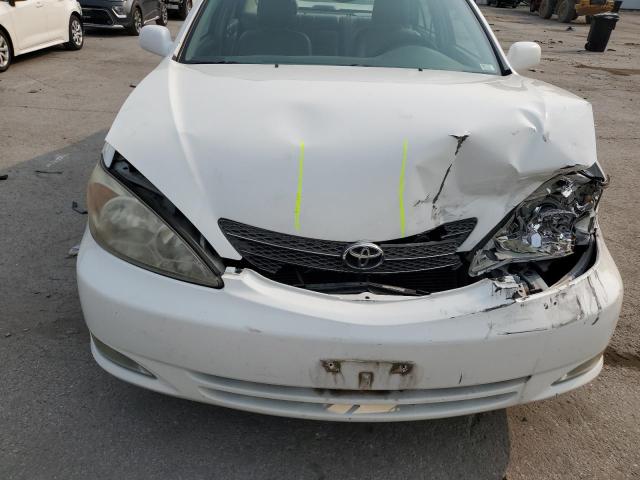 Photo 11 from auction – 2003 TOYOTA CAMRY LE with VIN 4T1BE32K73U236356