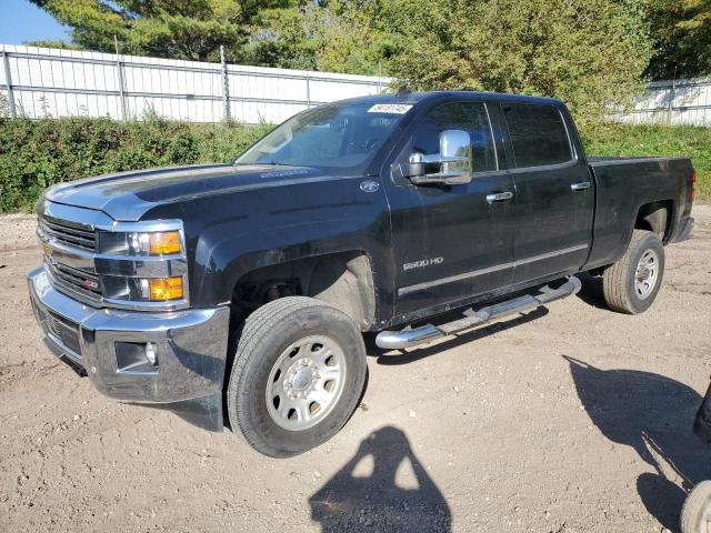 CHEVROLET SILVERADO 2015 with VIN 1GC1KWE84FF143152 - Photo from auction