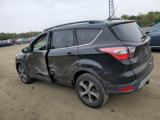 Photo 2 from auction – 2018 FORD ESCAPE SEL with VIN 1FMCU9HD4JUB94129