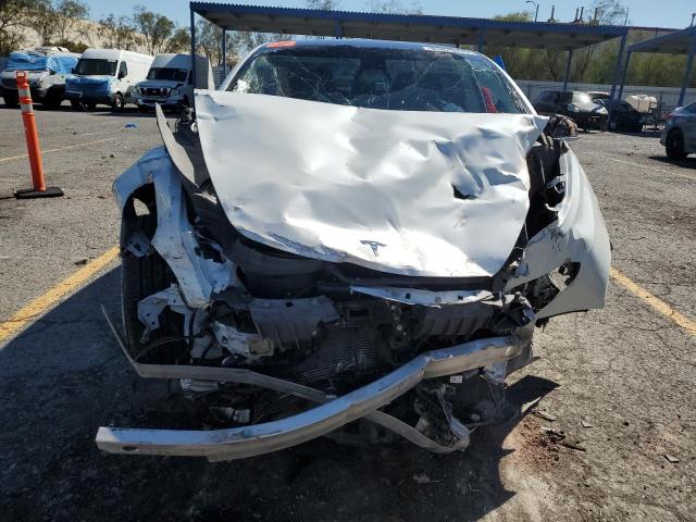 Photo 5 from auction – 2018 TESLA MODEL 3 with VIN 5YJ3E1EA4JF015688