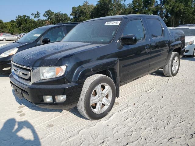 HONDA RIDGELINE 2011 with VIN 5FPYK1F56BB452813 - Photo from auction