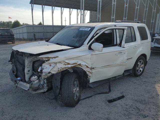 HONDA PILOT TOUR 2011 with VIN 5FNYF4H92BB038040 - Photo from auction
