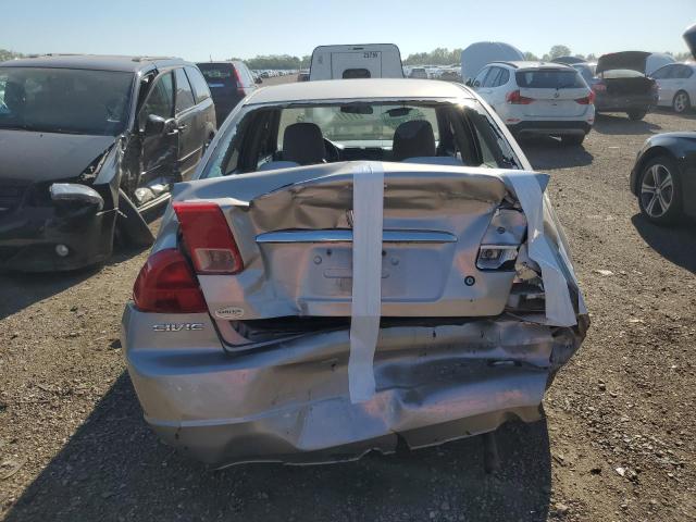 Photo 6 from auction – 2002 HONDA CIVIC LX with VIN 1HGES165X2L058676
