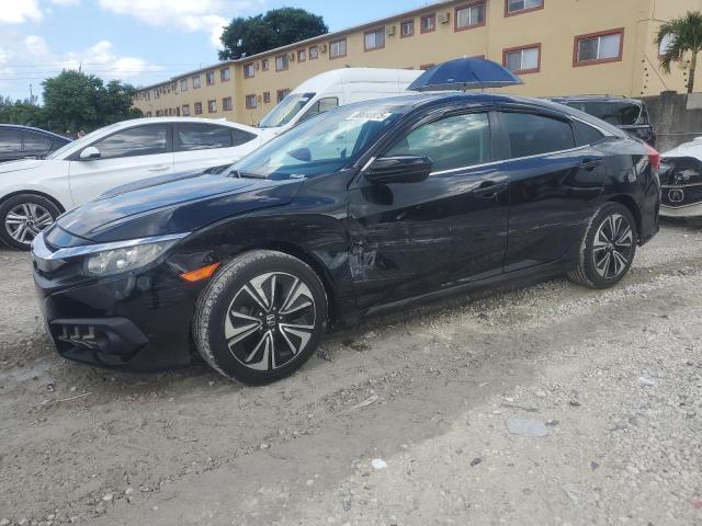 HONDA CIVIC EX 2017 with VIN 19XFC1F33HE211091 - Photo from auction