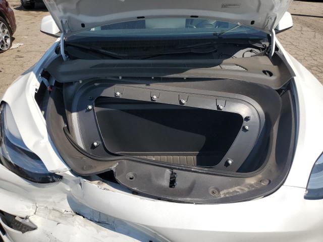 Photo 11 from auction – 2022 TESLA MODEL Y with VIN 7SAYGDEE5NF374402