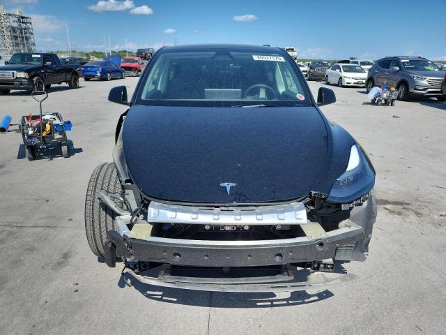 Photo 5 from auction – 2025 TESLA MODEL Y with VIN 7SAYGAEE7SF245152