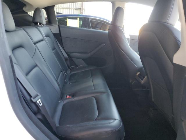 Photo 10 from auction – 2023 TESLA MODEL Y with VIN 7SAYGDEE9PA138142