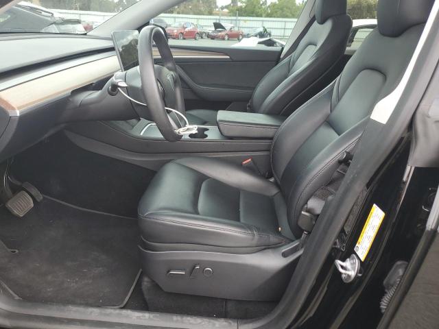 Photo 7 from auction – 2023 TESLA MODEL Y with VIN 7SAYGAEE9PF715124