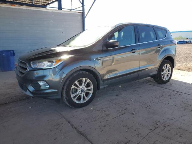 FORD ESCAPE SE 2017 with VIN 1FMCU0GD2HUC67165 - Photo from auction
