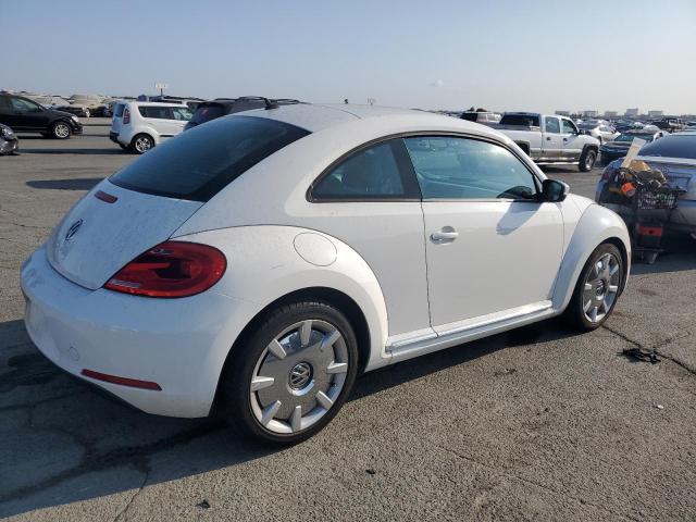 Photo 3 from auction – 2012 VOLKSWAGEN BEETLE with VIN 3VWHP7AT4CM622602