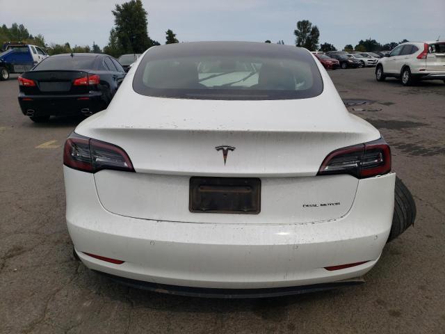 Photo 6 from auction – 2022 TESLA MODEL 3 with VIN 5YJ3E1EB3NF355011