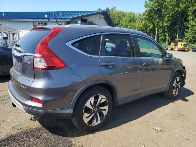 Photo 3 from auction – 2015 HONDA CR-V TOURI with VIN 5J6RM4H99FL031433