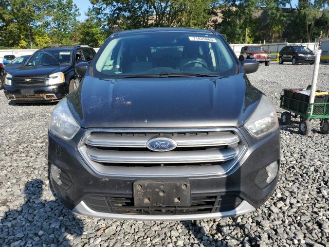 Photo 5 from auction – 2017 FORD ESCAPE SE with VIN 1FMCU9GD1HUD90010