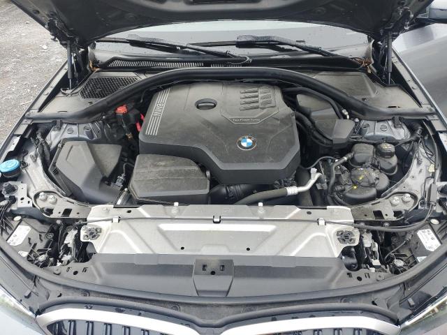 Photo 11 from auction – 2023 BMW 330XI with VIN 3MW89FF00P8D65293