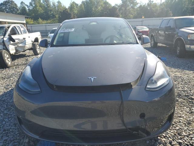 Photo 5 from auction – 2023 TESLA MODEL Y with VIN 7SAYGDEE3PA166793