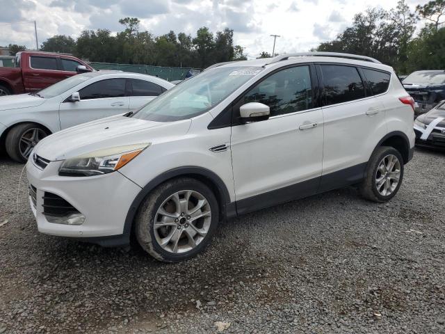 FORD ESCAPE TITANIUM 2016 with VIN 1FMCU0J98GUC39776 - Photo from auction