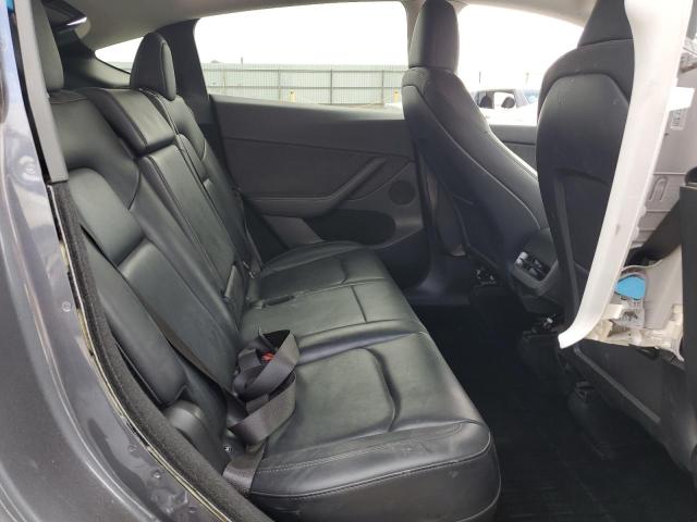 Photo 11 from auction – 2023 TESLA MODEL Y with VIN 7SAYGDEE1PF910670