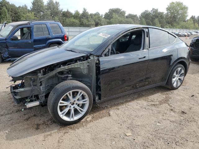 TESLA MODEL Y 2023 with VIN 7SAYGDEE4PA167337 - Photo from auction